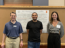 Scott, Robert, and Clair at the undergraduate research poster session, August 2023